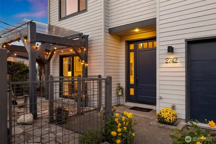 Front yard offers a sweet courtyard fully fenced