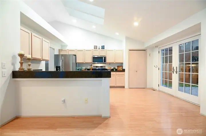 Kitchen with sitting bar.