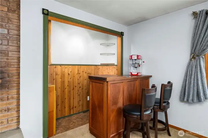 Full wet bar with sink & fridge