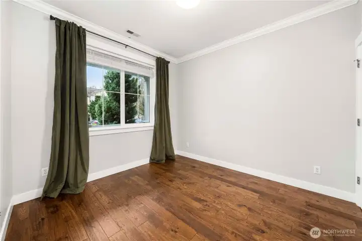 Den/guest room with access to bathroom