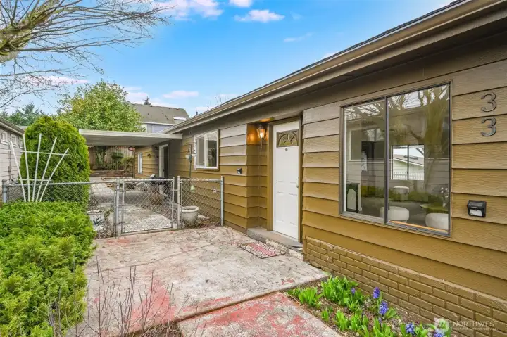 The fenced back yard keeps your furry friends contained and safe.