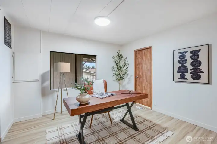 The second bedroom, here staged as an office.