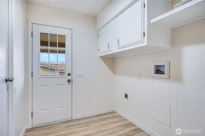 The roomy utility space has room for a full size washer and dryer.