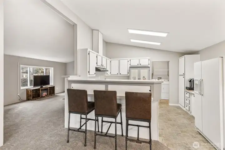 Eat-in Kitchen with a view of the front living room in the background