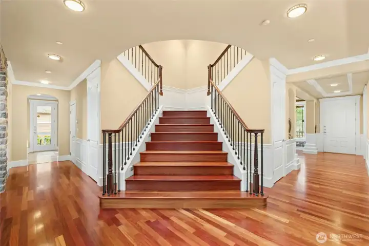 Striking Brazilian hardwood staircase, a true statement of quality construction and pride of ownership.
