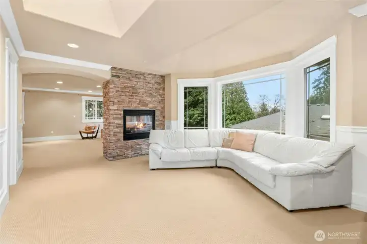 Elegant bonus sitting area with fireplace, seamlessly connected to the primary suite—perfect for a private retreat.