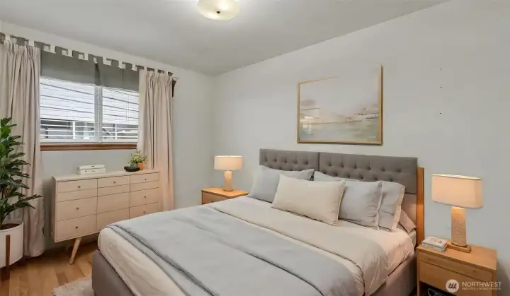 Third bedroom offers hardwood floors (virtually staged).