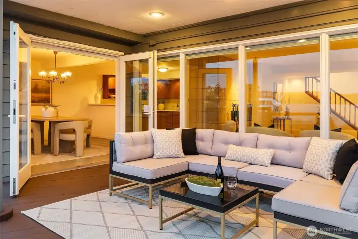 Looking back from the covered deck into the dining room.