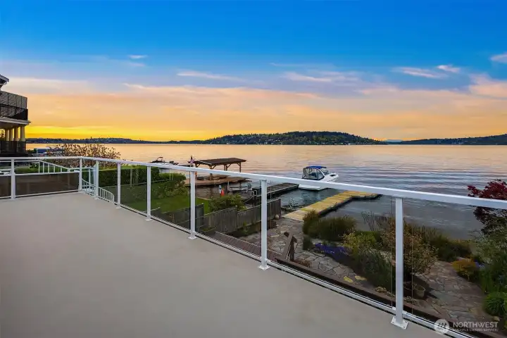 Let's explore the upper level: 3 bedrooms + sizable view deck that stretches along the whole width of the home.