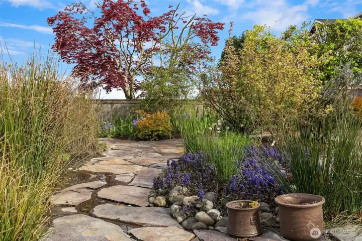 Wander around the grounds and discover a fabulous array of plantings, true master gardener's oasis.