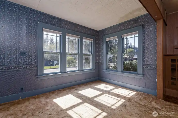 Flooded with natural light, this space sits just off the main living area.
