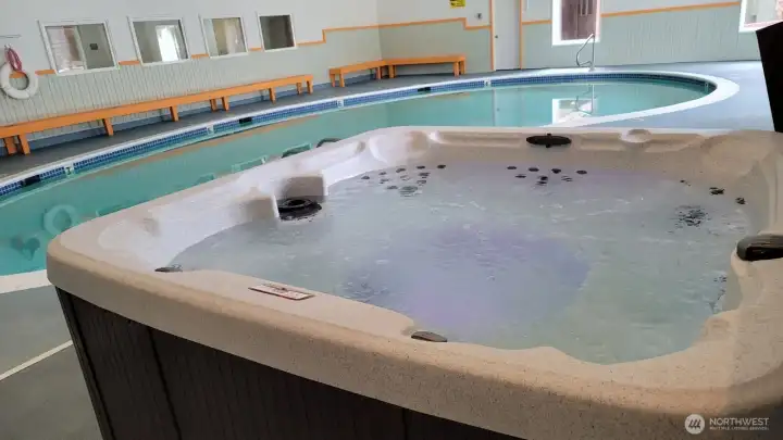 Indoor pool & hot tub for year round enjoyment.