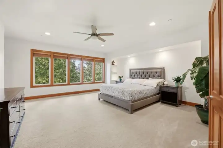Upstairs primary suite is spacious and private. Upstairs primary suite is spacious and private.