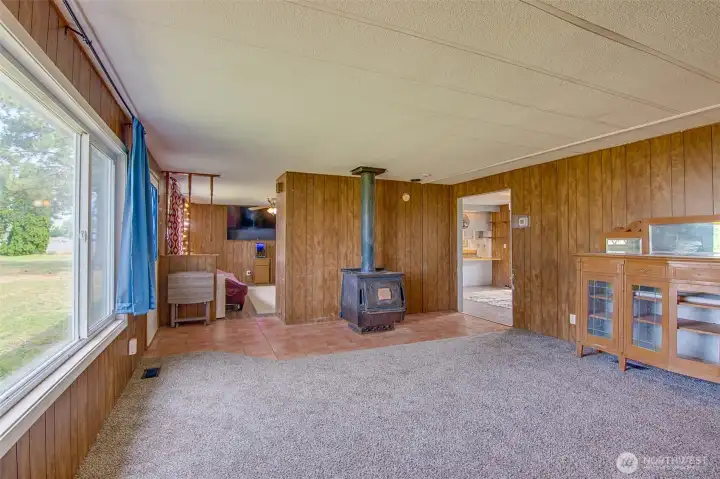 Family room/second living area with wood stove.