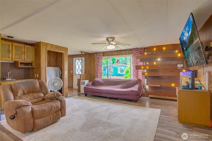 Living room with unique feature wall with shelves