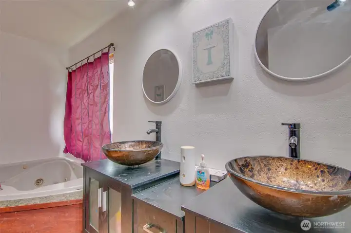 Master bath has dual designer sinks