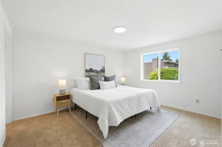 Primary bedroom on the upper level with full bath.