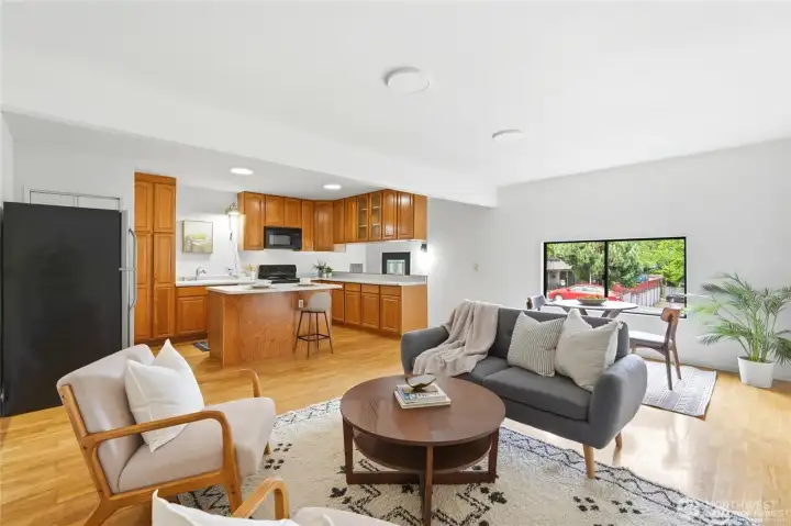 The expansive downstairs entertainment room is an absolute highlight, offering the ideal layout for game nights, holiday gatherings, hobbies, or creating your own media retreat.