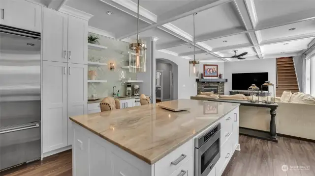 Perks to this great kitchen is the oversized island, coffee bar with additional sink, ample storage & counter space.