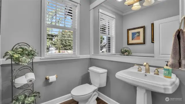 First floor powder room, conveniently located next to the family room.