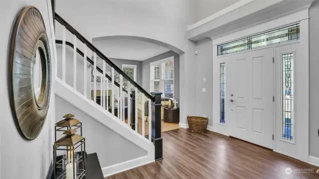 Spacious entrance to the home opens to this beautiful staircase.