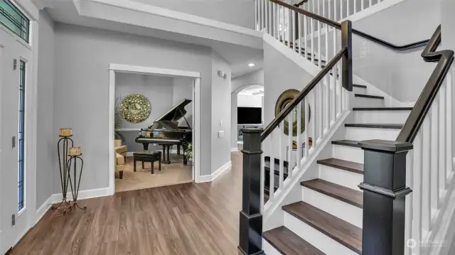 Another view of this gorgeous staircase, peering into the music room/office.