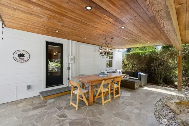 The covered patio is a wonderful spot to enjoy an afternoon.