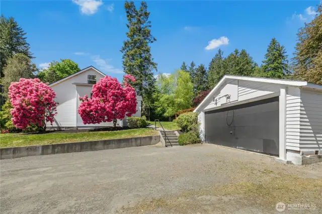 The rustic garage could be renovated, perhaps to add space above?
