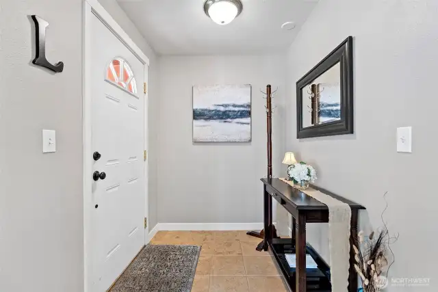 Foyer adjacent to living room.
