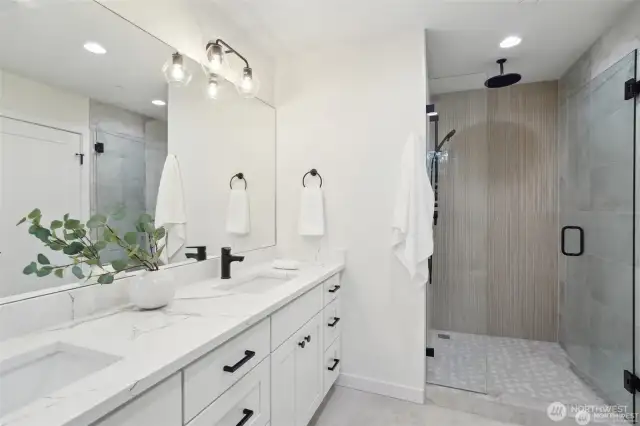 Photos of staged unit, 20313A. Walk-in shower with rain can showerhead and glass enclosure