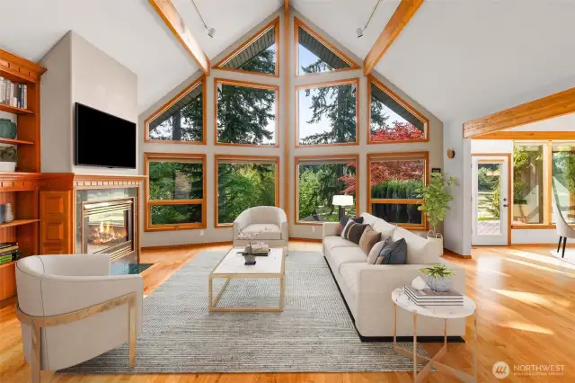 The cathedral-style windows gives you floor-to-ceiling views and floods the room with natural light. (Photo is virtually staged).