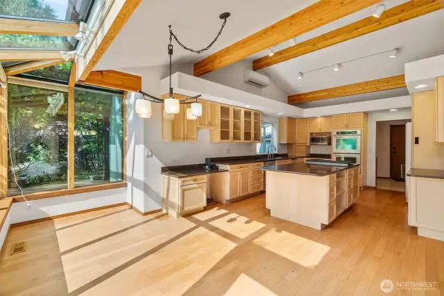 The kitchen area. Through the doorway on the right is the large laundry room and door to the garage.