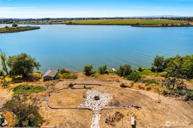 From the backyard, your lake view and access is amazing! There's a switchback you can access from the right side of the back yard.