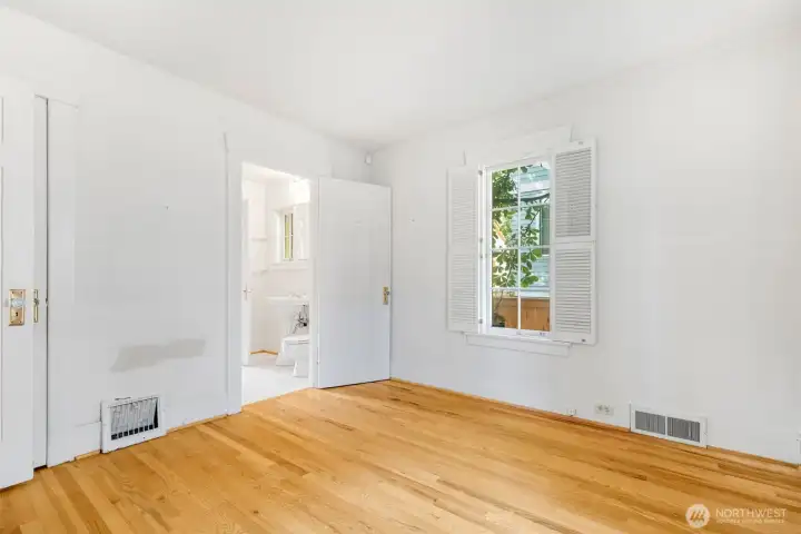 The back bedroom or primary bedroom is spacious...