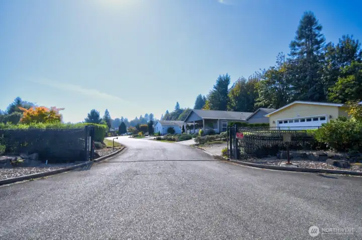 Automatic gates are closed 7 p.m. to 7 a.m.; neighborhood residents have remote control and key pad code.