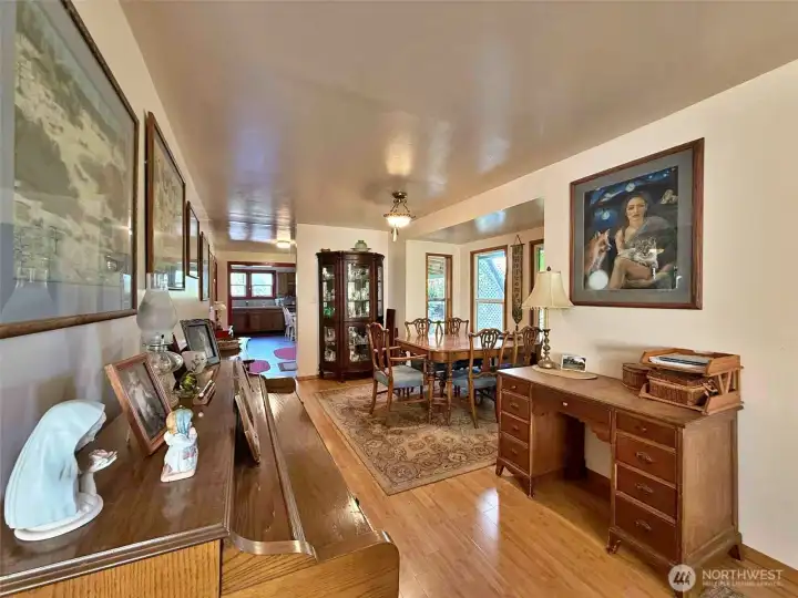 Dining room area looking towards kitchen from Living room down hall.