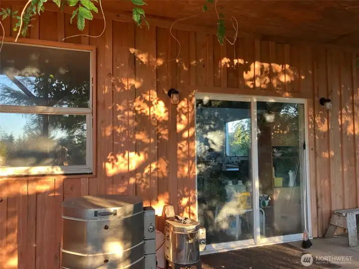 Secluded porch entry to pottery studio