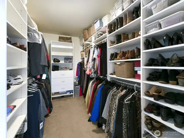 Very large walk-in closet in primary