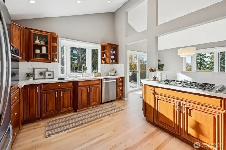 Looking towards the back of the house, the garden window and slider both look out on the southern exposure, deck and backyard.