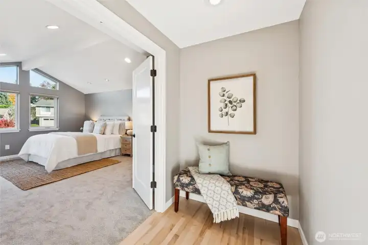 Enter the grand Primary suite through double doors...