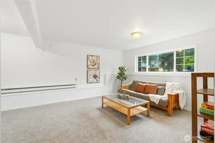 Fresh new paint and carpet and neutral tones allows you to make it your own. Tons of room in this family room.