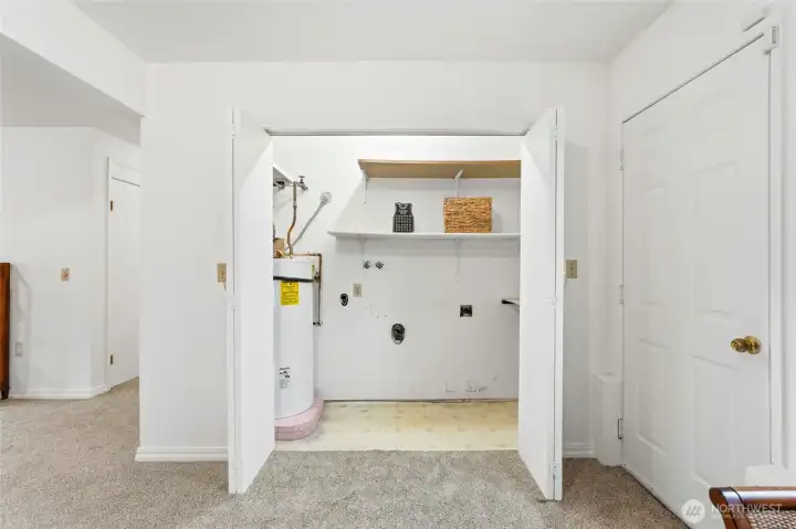 Laundry area... as a bonus sellers are including Washer/Dryer in garage.