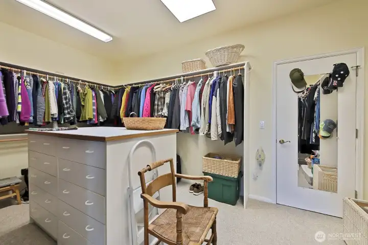 Large walk-in closet with built-ins
