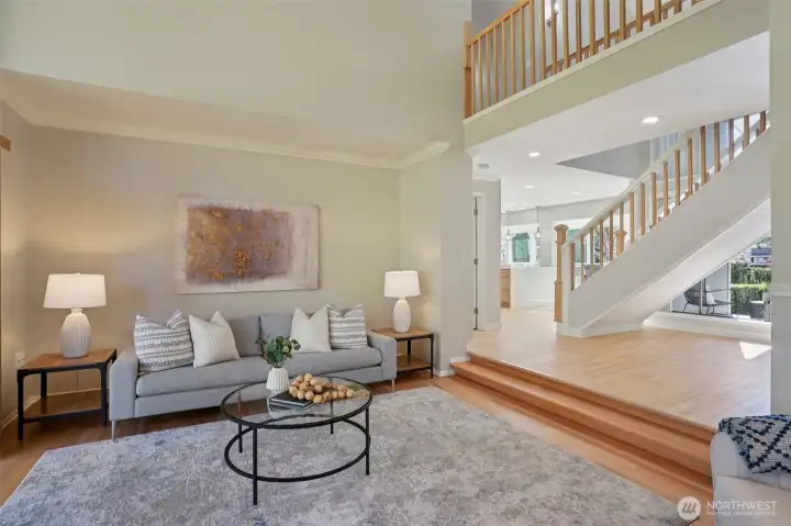 Light filled living room with newly refinished hardwood floors
