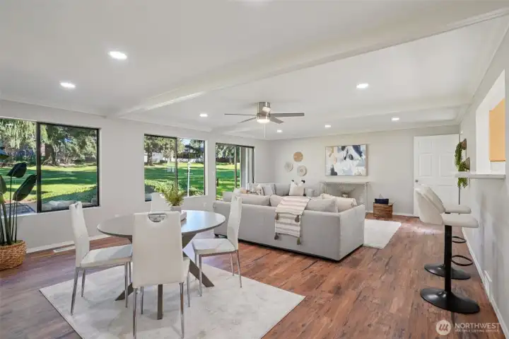 Expansive family room with half bath and access to back deck