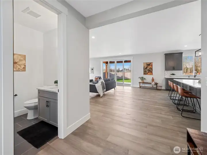 Guest 1/2 bathroom adjacent to living room.