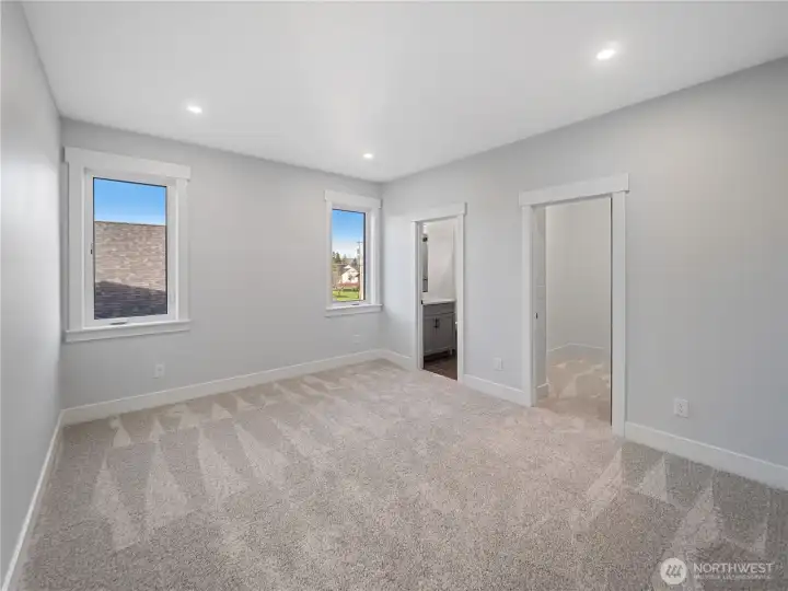 Guest bedroom #2 with full bath & walk-in closet.