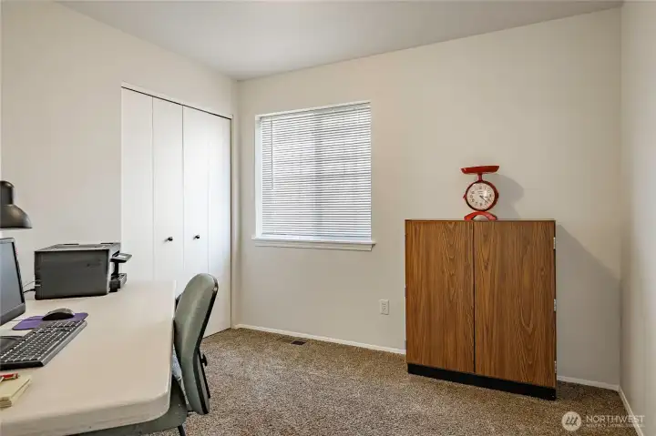 Bedroom 1, currently used as an office.
