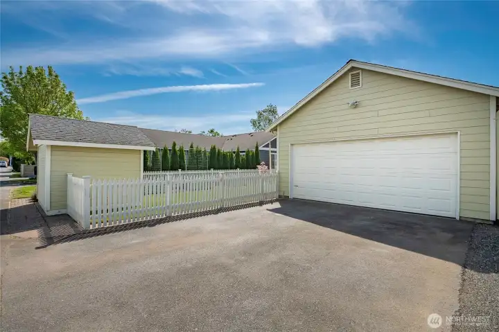 Alley access to the 2-car garage plus parking outside.