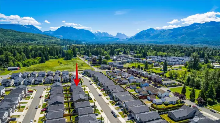 Drone view of neighborhood with Cascades in view